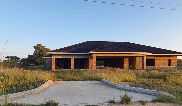 Modern Suburban Villa in Zimbabwe:Milano StoneCoated Metal Roof