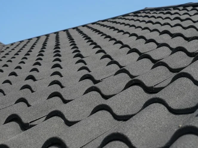 Stone coated metal roof tiles shown in a roof surface detail